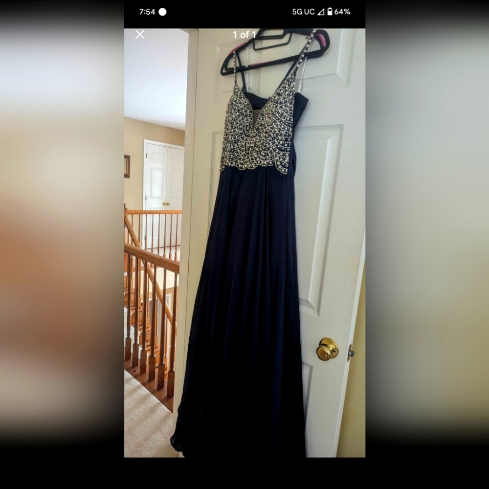 Evening gown dress worn once is pretty much brand new. Has some stretch.